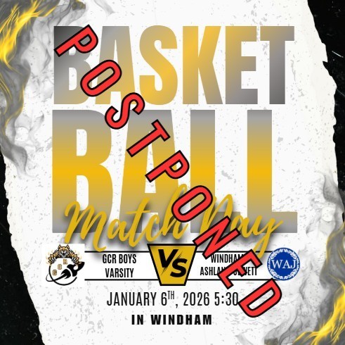 The graphic is a bold basketball game announcement. Large gold and gray text across the center reads “Basket Ball Match Day.” The background is textured white with black edges and gold flame-like accents. Below the main title are two team logos facing each other with a large “VS” between them. On the left is the GCR Boys Varsity logo, and on the right is the Windham–Ashland–Jewett (WAJ) logo. Text beneath the logos states “January 6th, 2026 – 5:30” and “In Windham.” The overall color scheme is gold, black, gray, and white, giving the design an energetic, competitive feel. Giant red text that reads "postponed" lays across the image