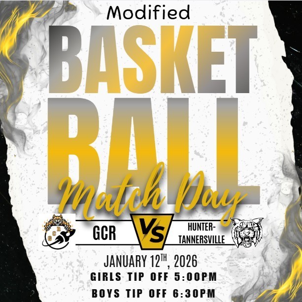 The image is a bold game-day graphic for modified basketball. Large gold and white text reads “Basketball Match Day” with the word “Modified” at the top. In the center, two team logos face each other with “GCR vs Hunter-Tannersville” displayed between them. Below, text lists the date “January 12th, 2026,” followed by the game times: girls tip off at 5:00 PM and boys tip off at 6:30 PM. The background features a textured white surface with black and gold smoky accents and flame-like designs along the edges, giving the graphic an energetic, competitive feel.