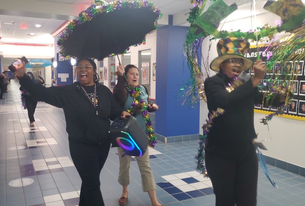 RES staff members joined in the vibrant & cultural  "Second Line" New Orleans style  hallway parade!!  2.9.26