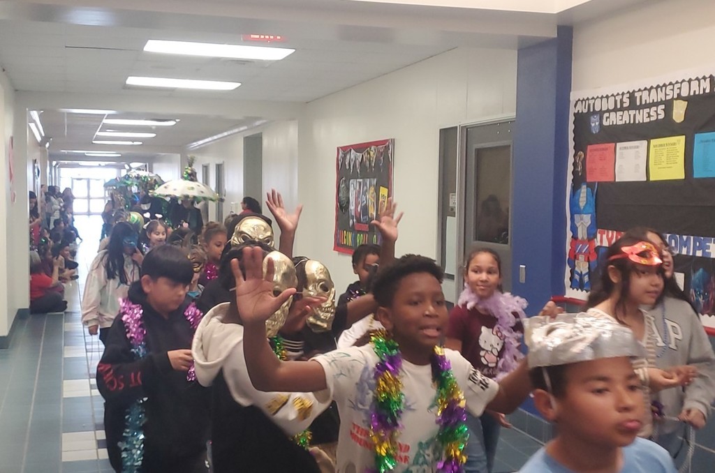 What is a Mardi Gras Parade without B...E...A...D...S ?!?!?! RES's Student Council Members tossed the highly anticipated beads out to the students! 2.9.26