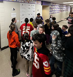 students placing panthers on board