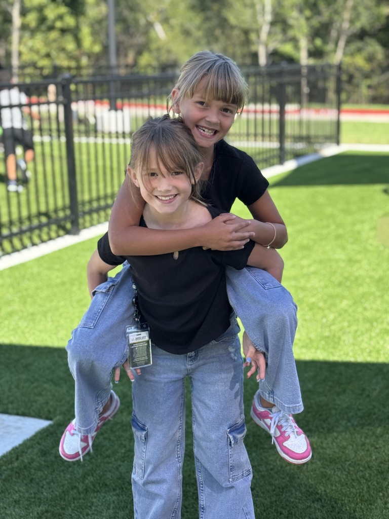Pictures of staff and students dressed as twins