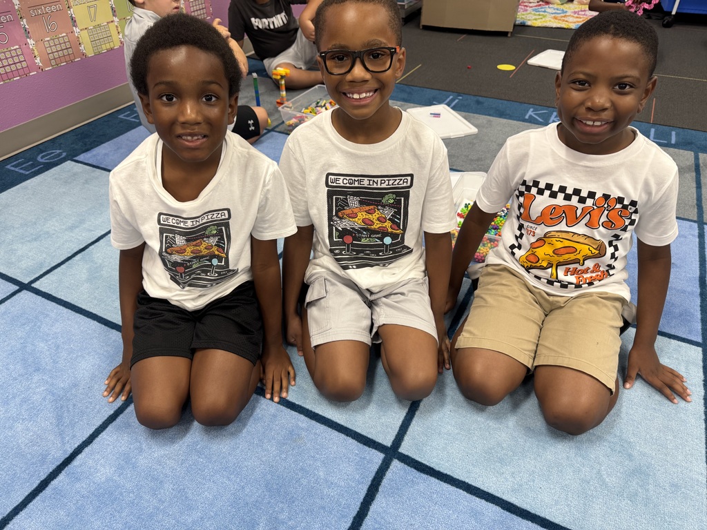 Pictures of staff and students dressed as twins