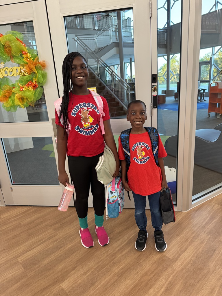 Pictures of staff and students dressed as twins