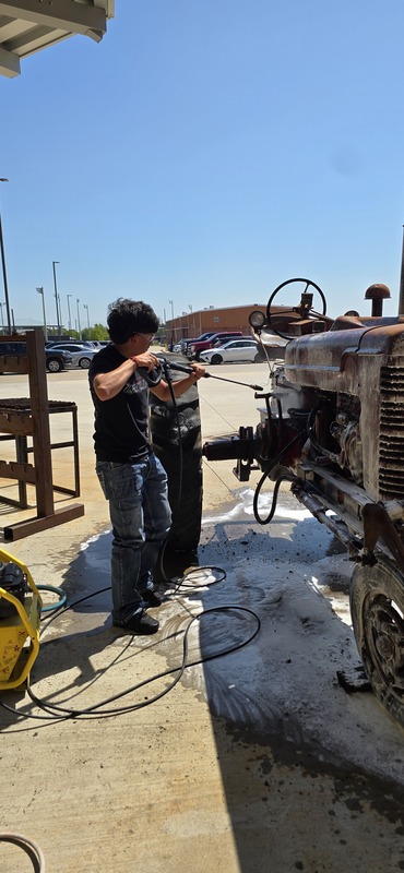 Washing the tractor