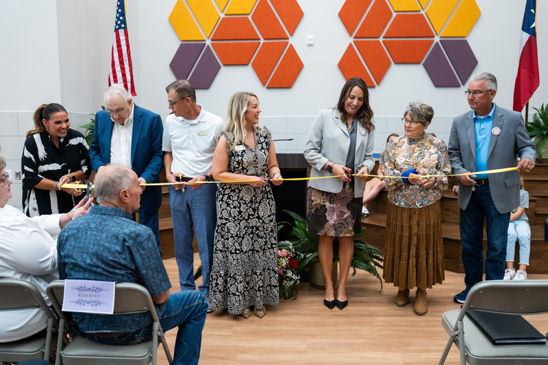 School board and Sara Moss at the ribbon cutting.