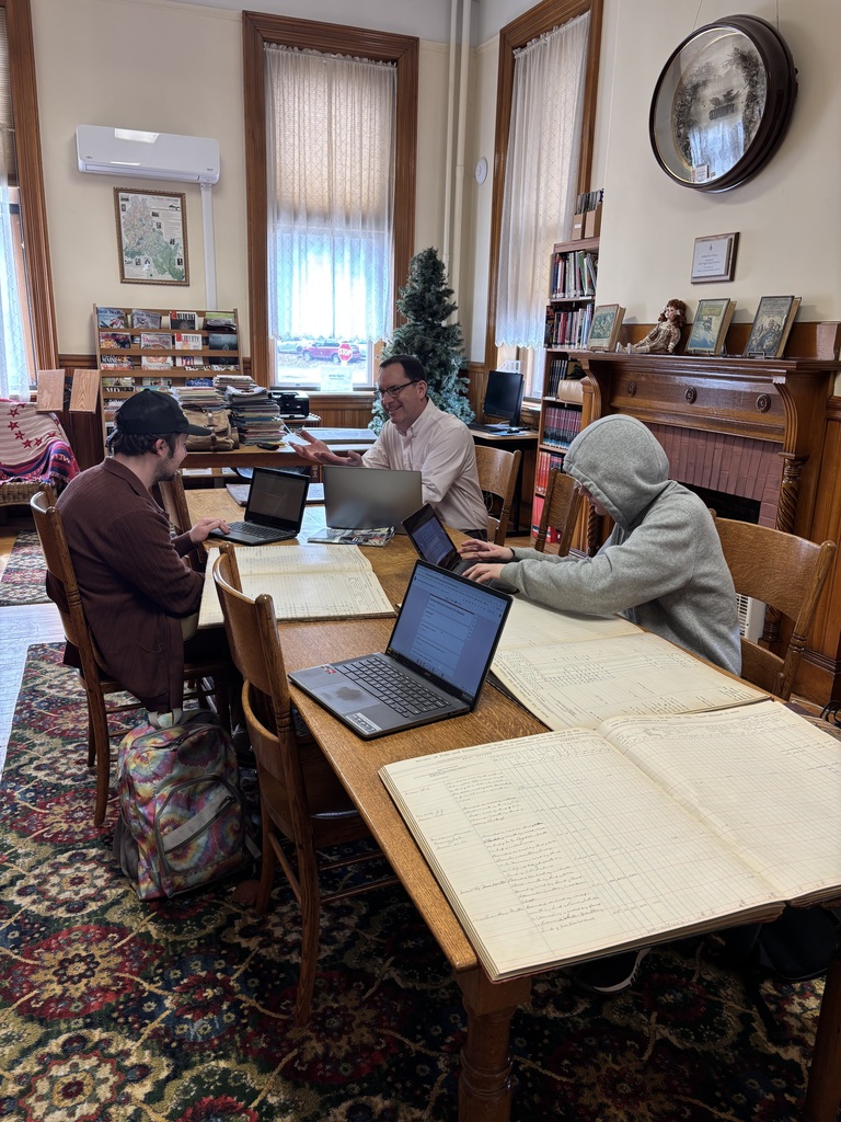 Mr. Hanish talks with students. 