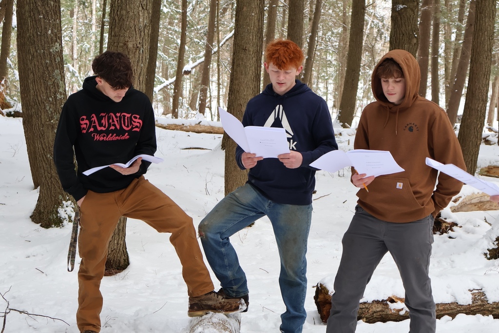 Reading in the snow.