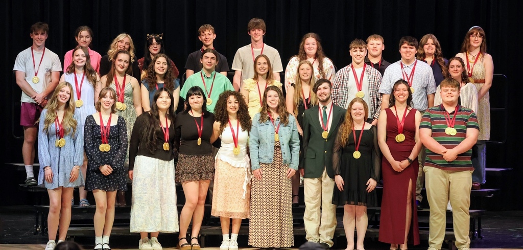 VPA Award Winners Pose on Stage for a photo.
