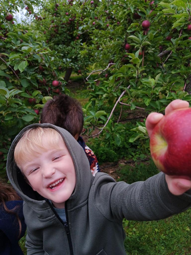 Boy with apple.