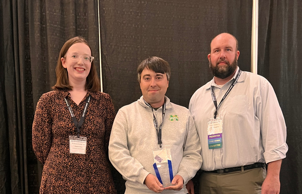 Eleanor Chow, Student Advisor for MACE, Adam Goad, Director of Adult Education, and Joshua McNaughton, MAEA President