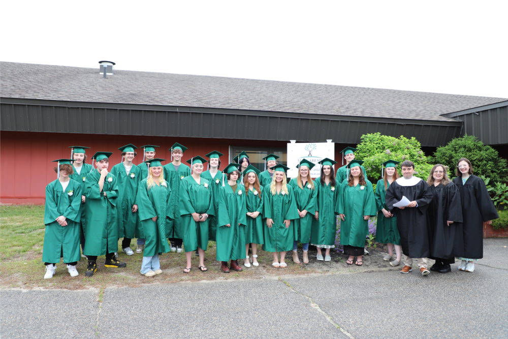 The Class of 2025 outside of the Massabesic Adult Education building