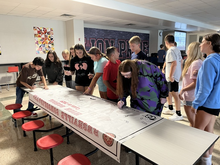 signing the banner