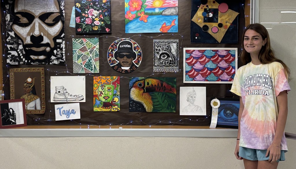 Student with artwork. 