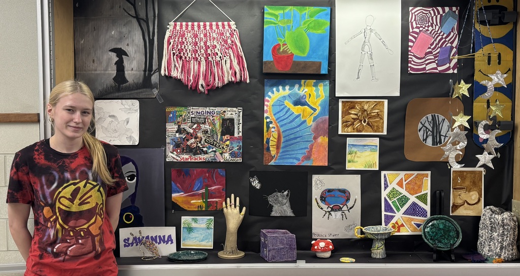 Student with artwork. 