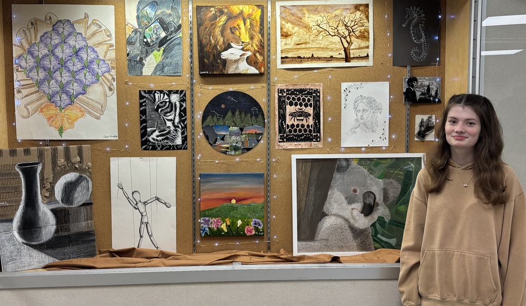 Student with artwork. 