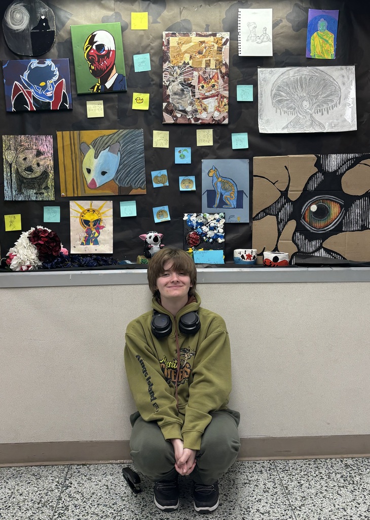 Student with artwork. 