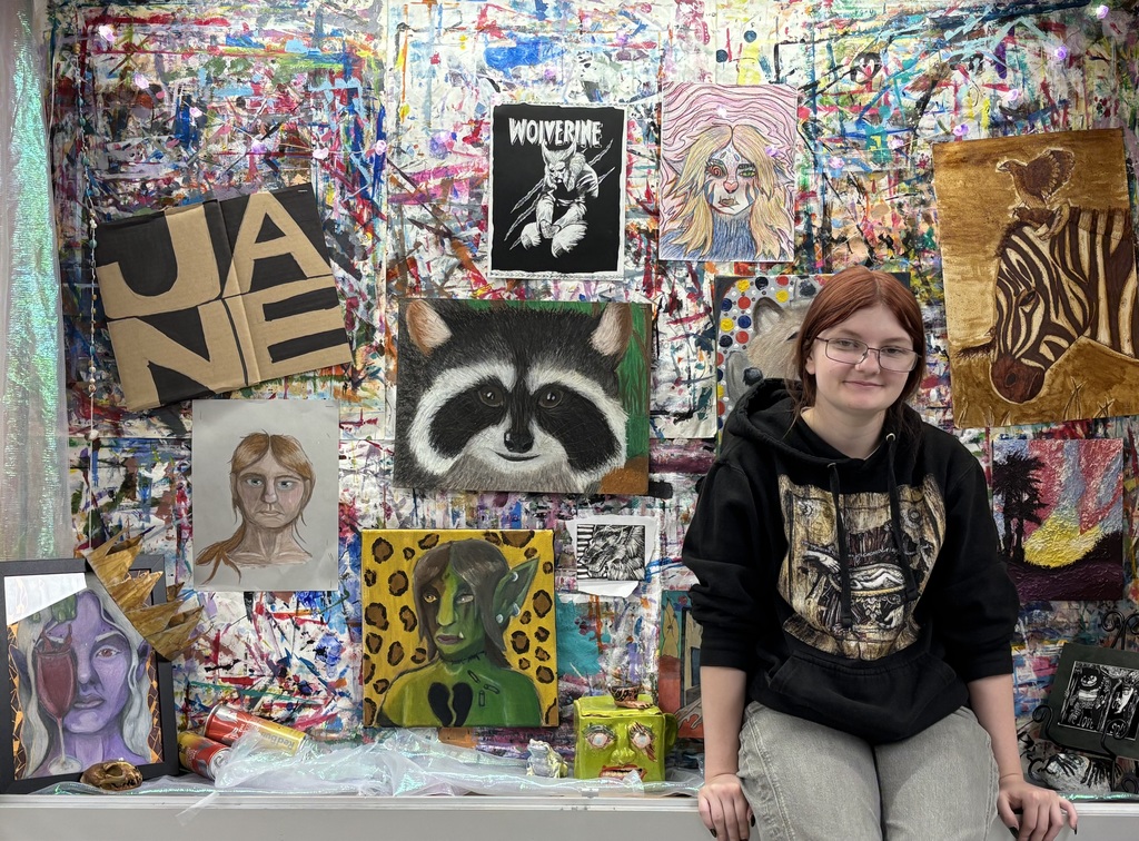 Student with artwork. 