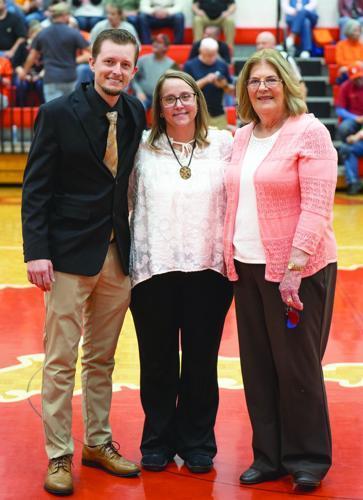 Pictured, from left, are Russell County school board member J.J. Eaton, Honaker coach Misty Davis Miller and Russell County school board chair Cynthia Compton.