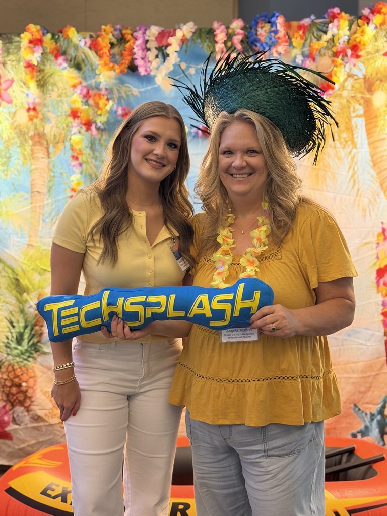 Mrs. Mullins and her daughter Madison cheesing at the photo booth at TechSplash.