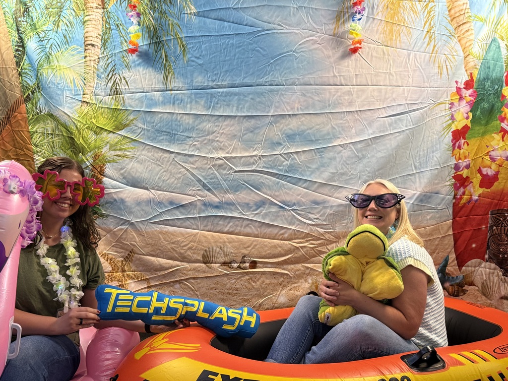 Mrs. Oder and Mrs. Cumpston from LES are  loving the props in the photo booth at TechSplash.