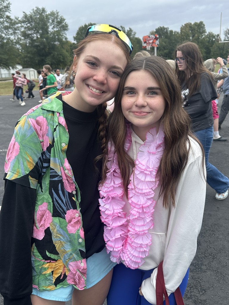 students dressed in Hawaiian-themed clothes