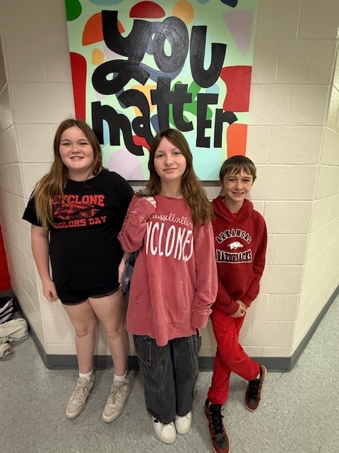 students dressed in red