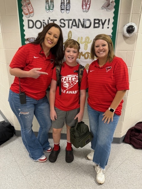 students dressed in red