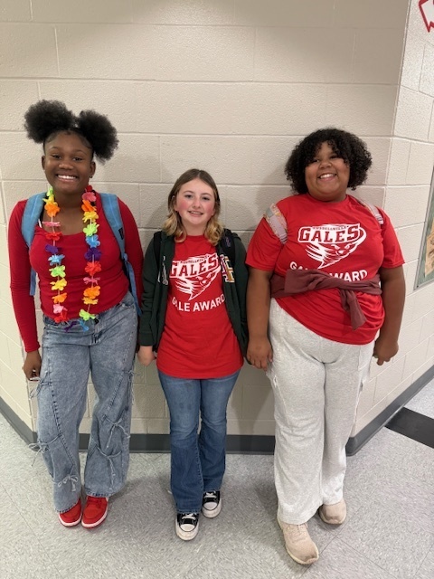 students dressed in red