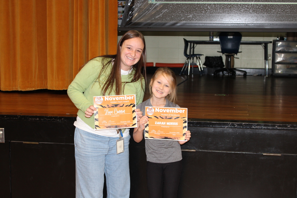 Mrs. Cannon and Zarah Morris receiving their awards. 