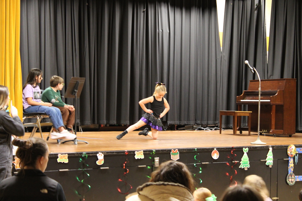 Student doing a cheerleading routine.
