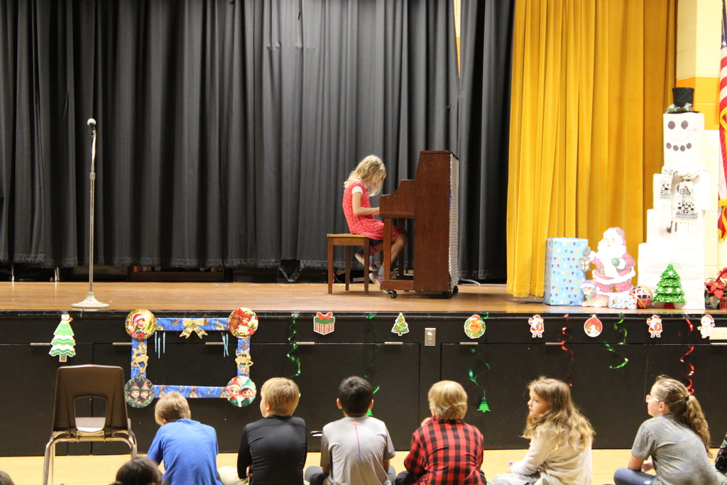 Student playing piano