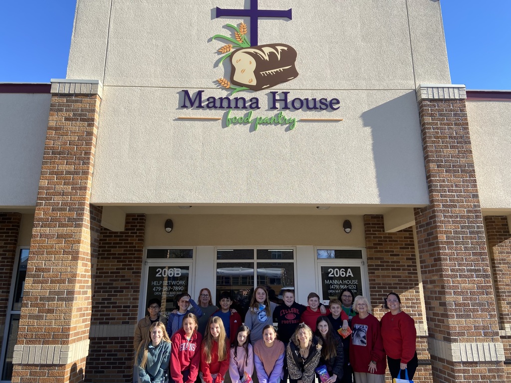 students outside the Manna House