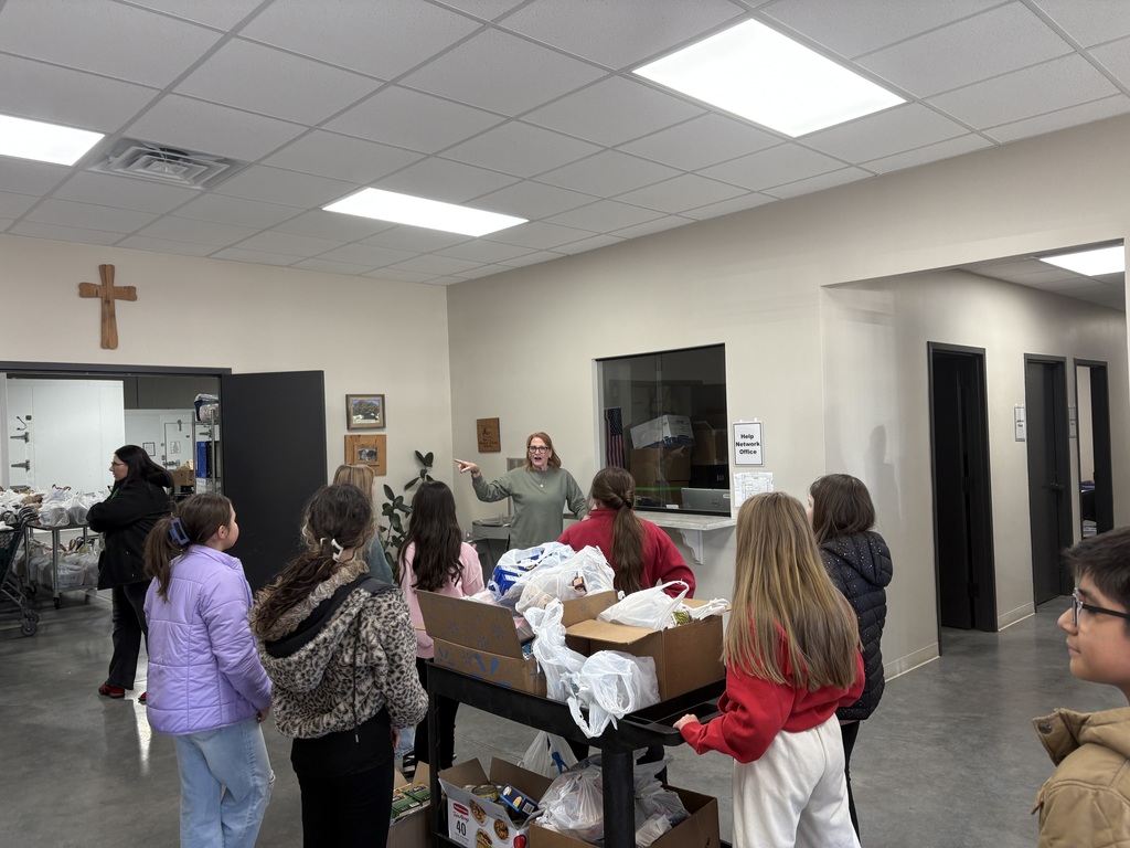 students listening to the tour