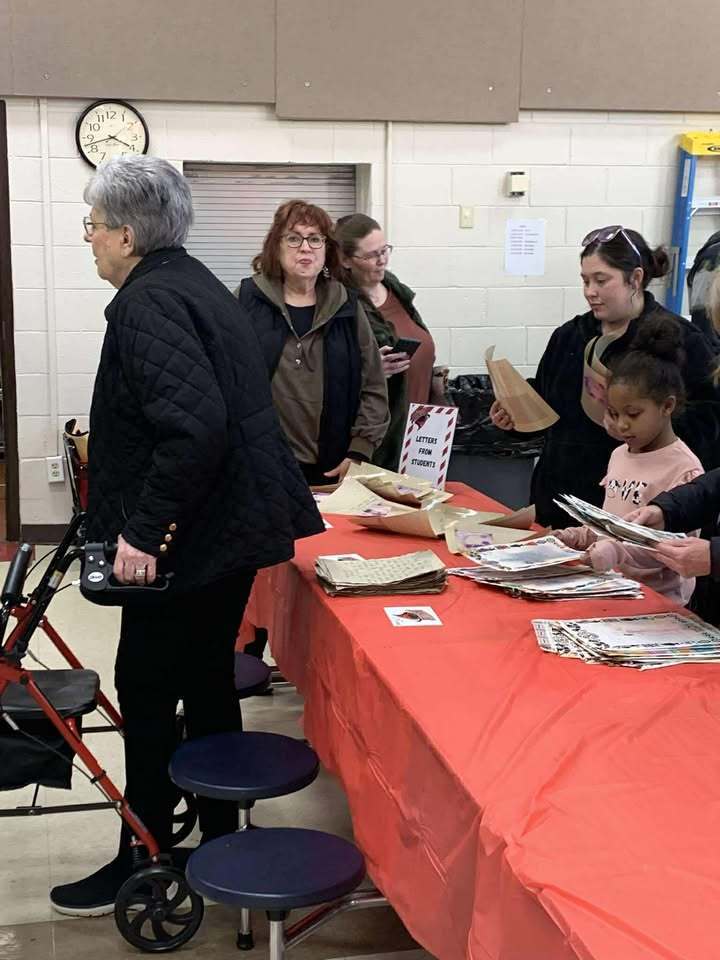 Visitors looking at memorabilia