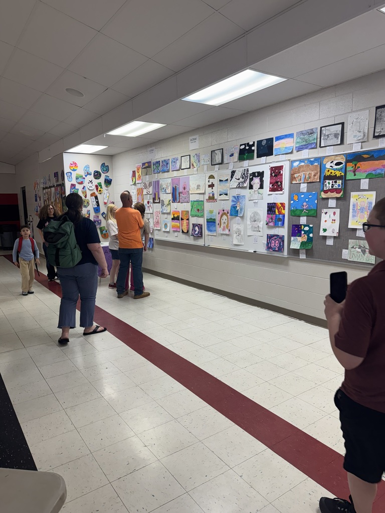 families looking at exhibits