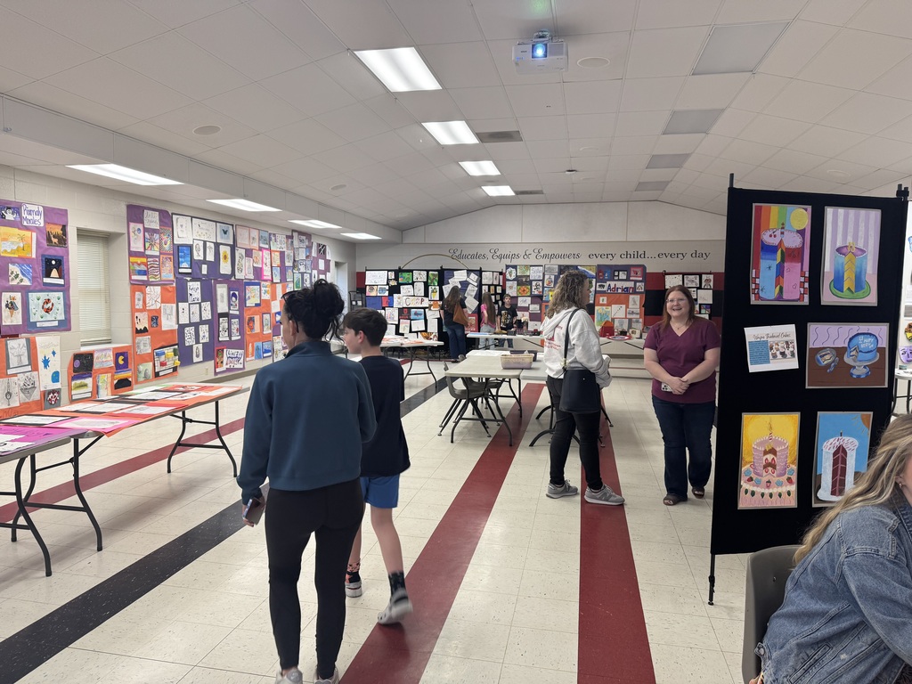 families looking at exhibits