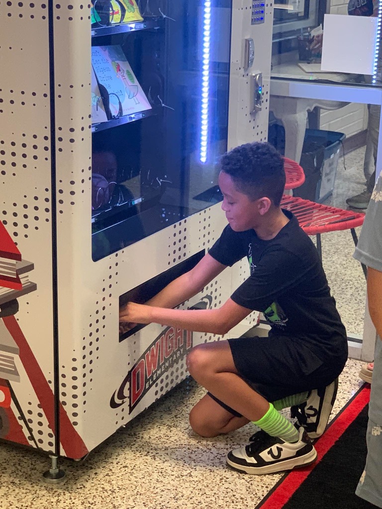Students selecting books 