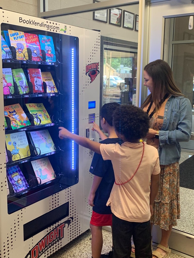 Students selecting books 