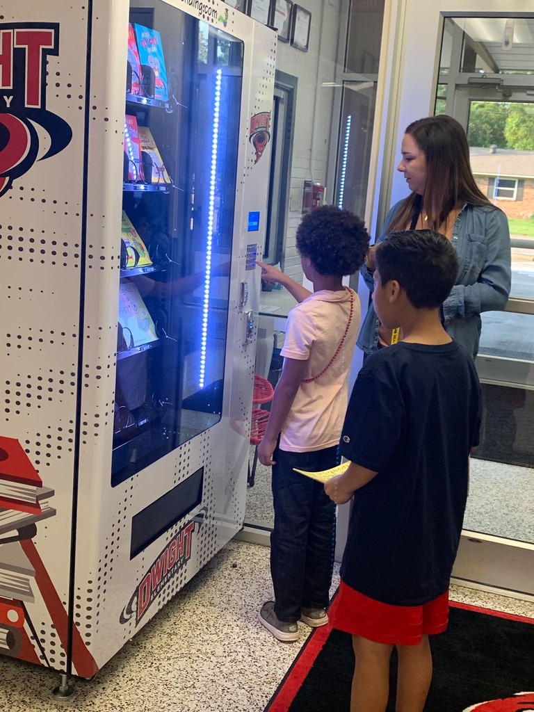 Students selecting books 