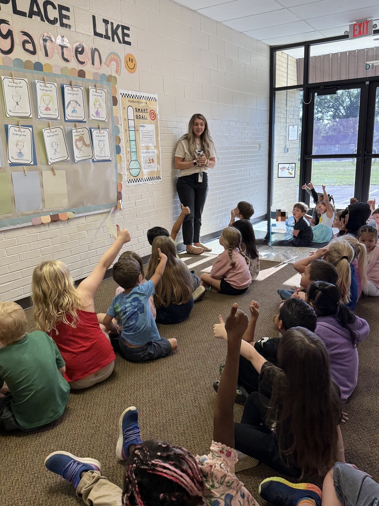 Kindergarten students reviewing goal