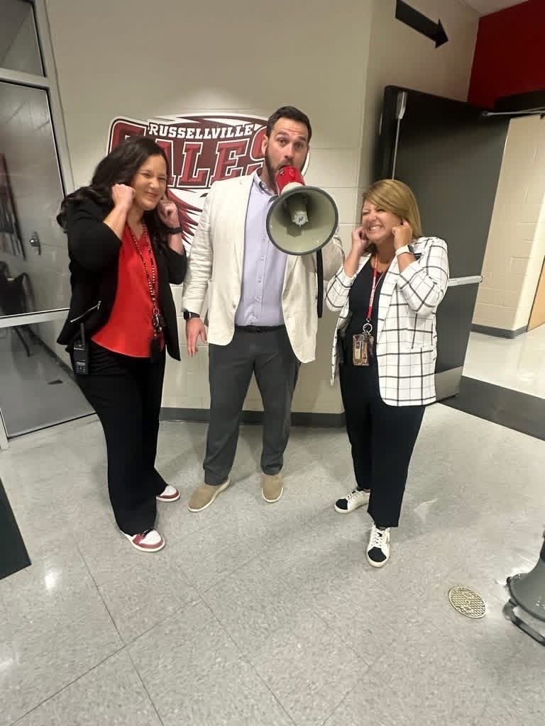mr. farr pretending to be loud with a horn