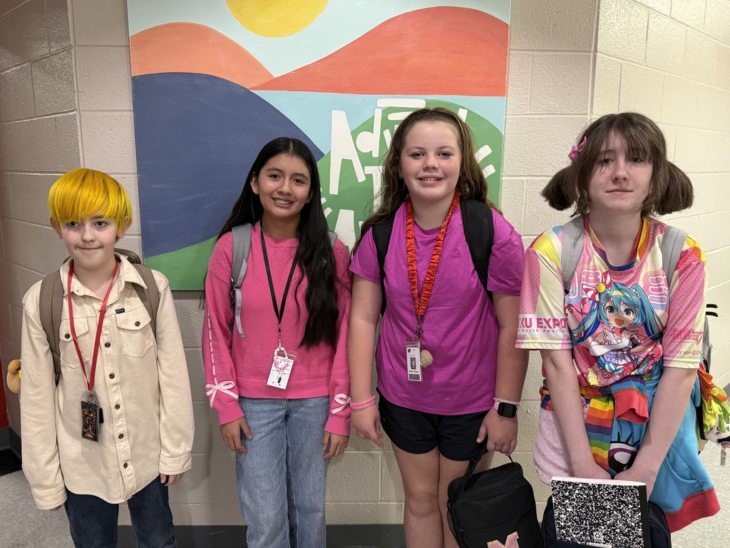 celebrating neon day for red ribbon week - students posing for a photo