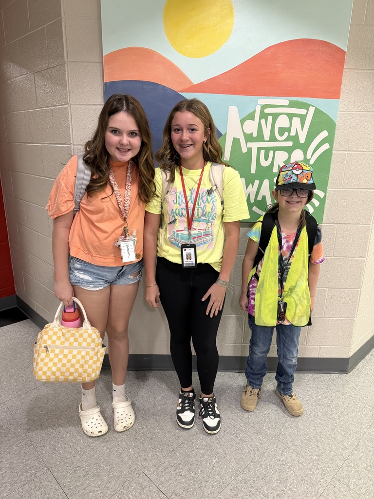 celebrating neon day for red ribbon week - students posing for a photo