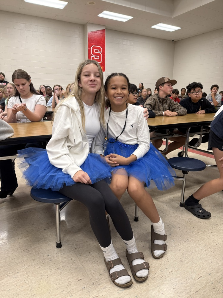 two girls in tutus
