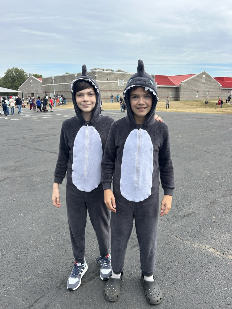 two boys dressed as sharks