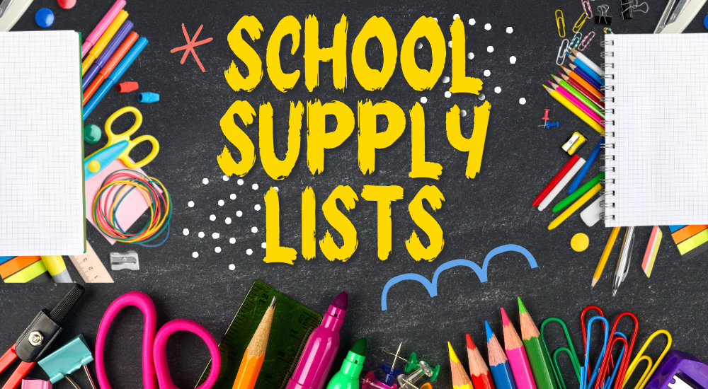 School supply lists are written on a chalkboard with a variety of colorful pencils, scissors, and paper.