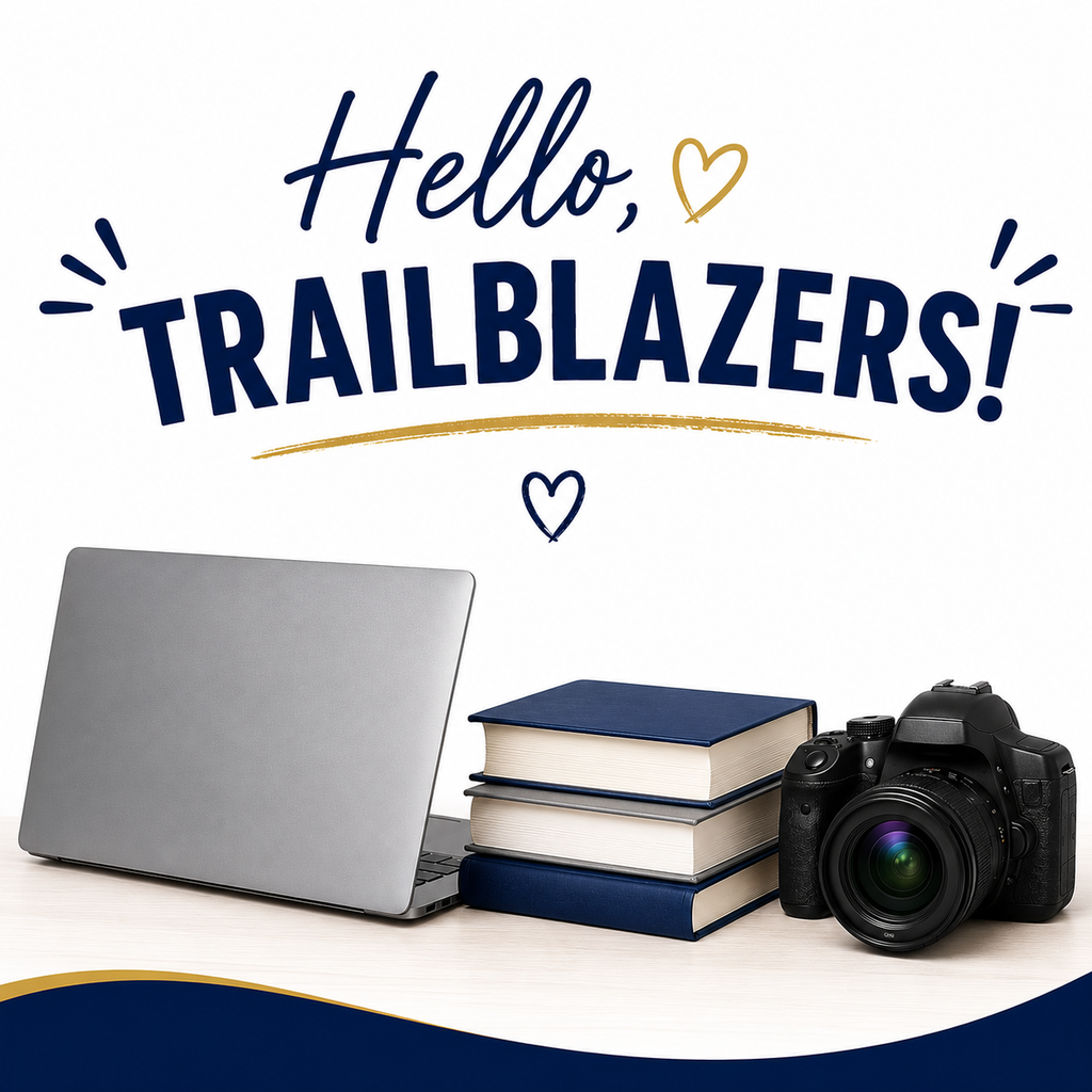 A laptop, books, and a camera on a desk. Text reads "Hello, Trailblazers!" against a white background.