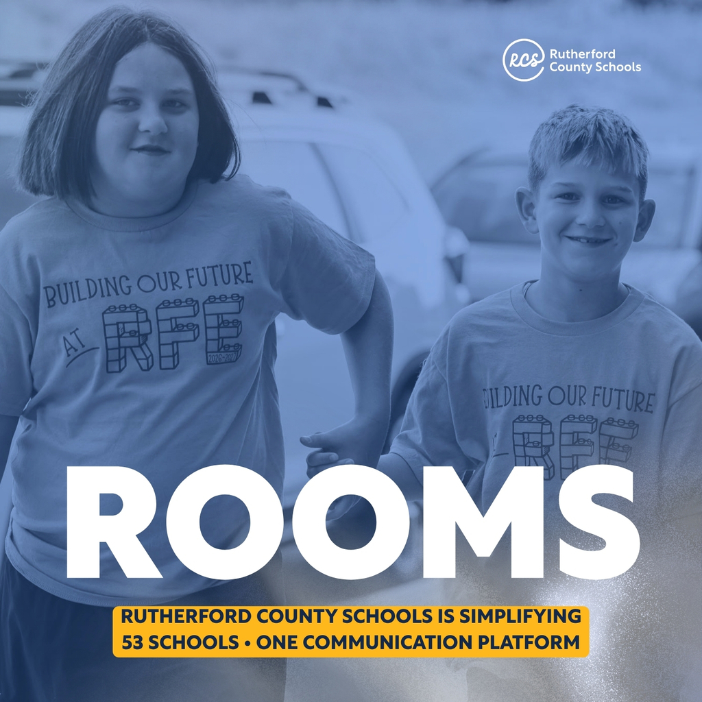 Two children in gray t-shirts stand in front of a parked car. The word "ROOMS" is displayed prominently.