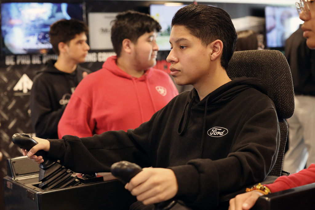 Male student drives simulator